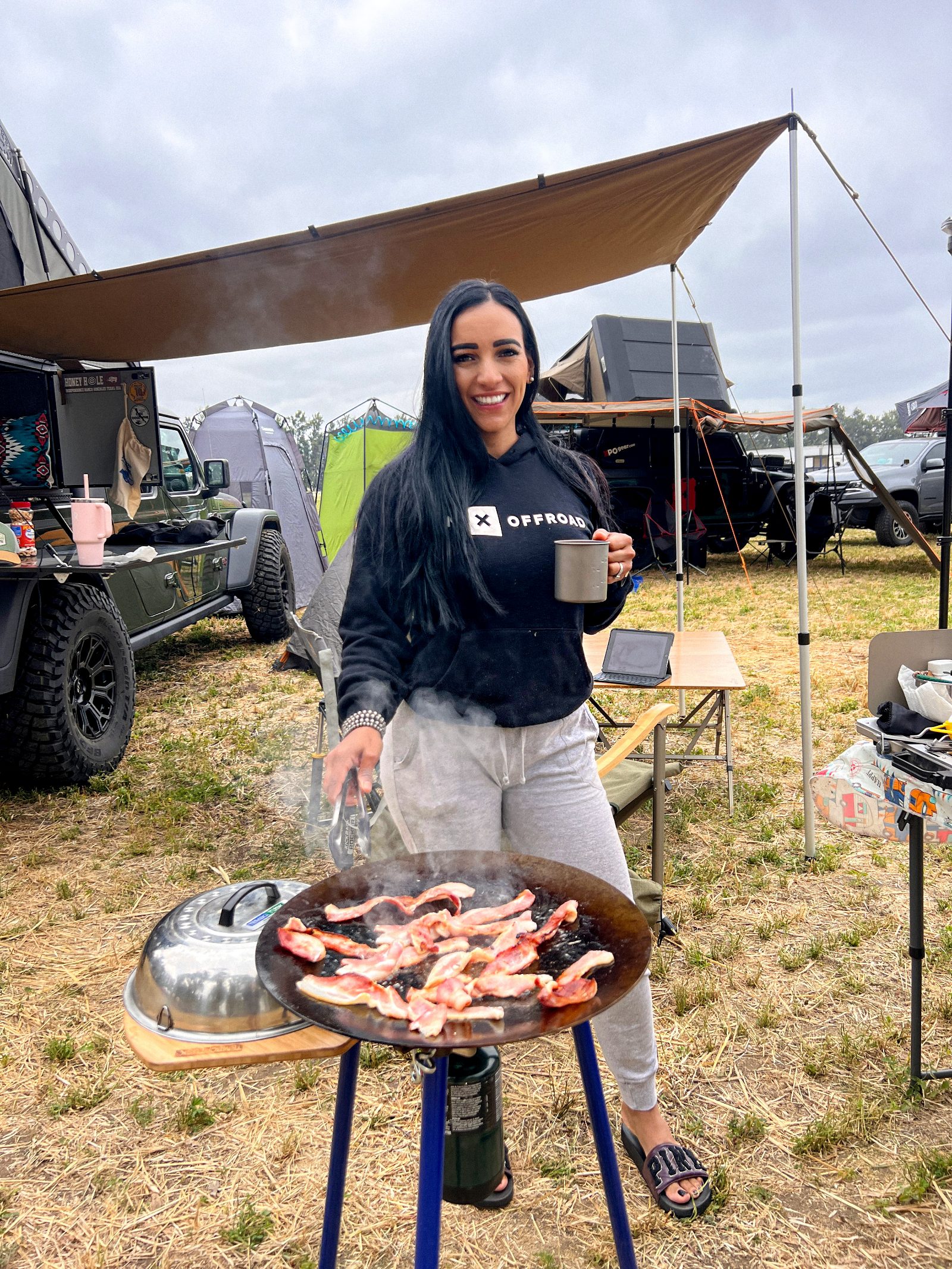 Paola cooking at camp